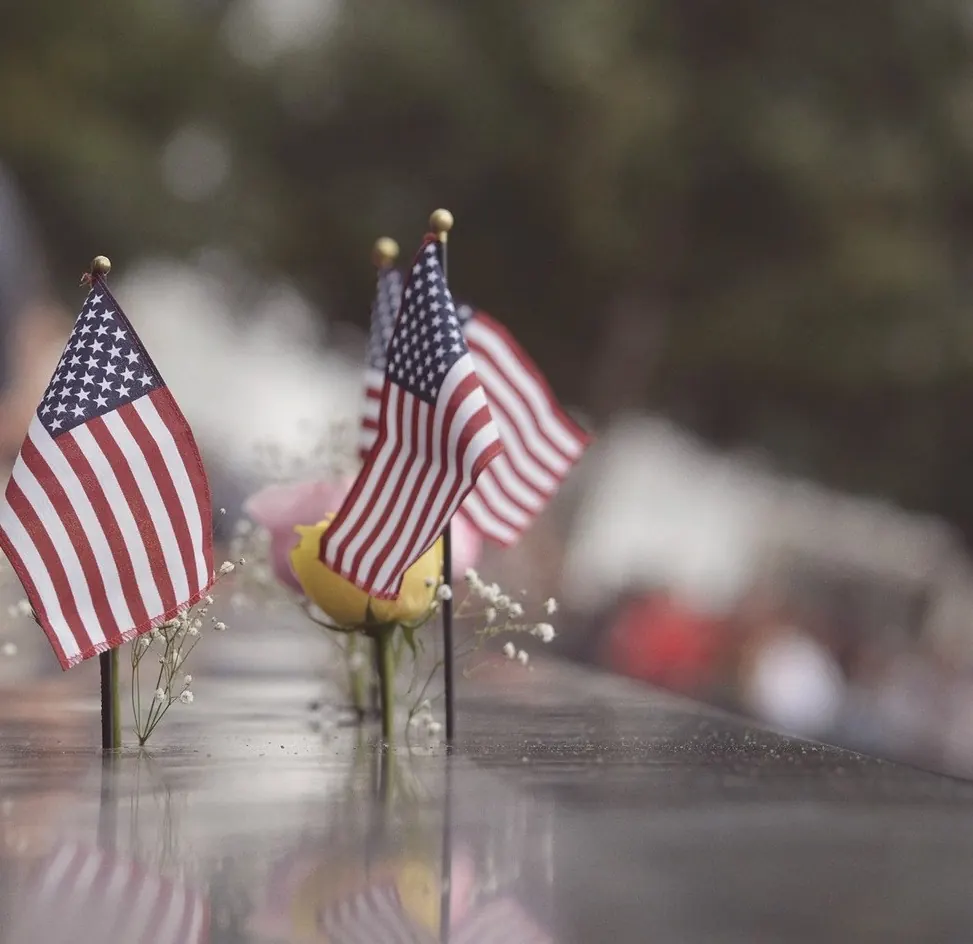 American flags placed at veterans’ graves